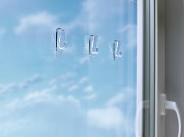 TESA 2X KLEVENDE TRANSPARANTE HAKEN VOOR GLAS
